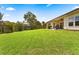 Spacious backyard featuring a patio, lawn, and privacy fence, perfect for outdoor entertaining at 504 Dolphin Dr, Summerville, SC 29485