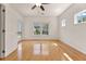 Spacious bedroom with hardwood floors, lots of light, and a door leading to the backyard at 504 Dolphin Dr, Summerville, SC 29485