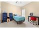 Comfortable bedroom with ample natural light, modern desk, and neutral walls at 504 Dolphin Dr, Summerville, SC 29485