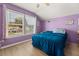 Comfortable bedroom with large window and a view of the outdoors at 504 Dolphin Dr, Summerville, SC 29485