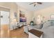 Bright living room features hardwood floors, ceiling fan, and built-in entertainment center niche at 504 Dolphin Dr, Summerville, SC 29485