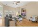 Bright living room features hardwood floors, recessed lighting, and large windows for natural light at 504 Dolphin Dr, Summerville, SC 29485