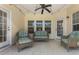 Relaxing covered patio with comfortable seating and string lights overhead at 504 Dolphin Dr, Summerville, SC 29485