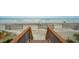 Walk right out onto the sandy beach, with convenient stairs from the home at 505 E Arctic Ave, Folly Beach, SC 29439