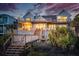 Expansive multi-story home with multiple decks and stairs leading down to the beach at 505 E Arctic Ave, Folly Beach, SC 29439