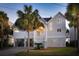 Charming beach home with elevated construction, a lush lawn and well-maintained yard at 505 E Arctic Ave, Folly Beach, SC 29439