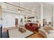 Spacious living room with high ceilings, hardwood floors and comfortable seating at 505 E Arctic Ave, Folly Beach, SC 29439