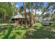 Expansive backyard featuring a lush lawn and patio, perfect for outdoor living at 509 E Ashley Ave, Folly Beach, SC 29439