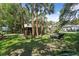 Great backyard featuring seating and mature trees at 509 E Ashley Ave, Folly Beach, SC 29439