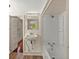 Bathroom featuring a tub and shower combination with white fixtures at 509 E Ashley Ave, Folly Beach, SC 29439
