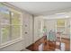 Sunny dining area with hardwood floors at 509 E Ashley Ave, Folly Beach, SC 29439