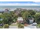 Charming beach home with lush greenery, ocean views, and a relaxing coastal atmosphere at 509 E Ashley Ave, Folly Beach, SC 29439