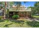 Charming exterior view of the home, showcasing the inviting front porch at 509 E Ashley Ave, Folly Beach, SC 29439