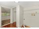 Functional laundry area with a closet, shelving, and white walls at 509 E Ashley Ave, Folly Beach, SC 29439