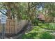 A path to public beach access near a charming pink house at 509 E Ashley Ave, Folly Beach, SC 29439