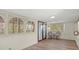 Bright sunroom with many windows, neutral paint, and beach themed chairs at 509 E Ashley Ave, Folly Beach, SC 29439