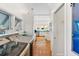 Modern laundry room with stainless steel appliances, and views into the adjacent modern kitchen at 509 W Ashley Ave, Folly Beach, SC 29439