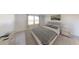 Bright bedroom with a large bed, neutral decor, and a scenic view from the windows at 550 Pender Woods Dr, Summerville, SC 29486