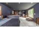 Spacious bedroom with multiple windows, closet system and wood floors at 5904 Hagood Ave, Hanahan, SC 29410
