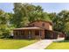 Charming two-story home with a covered porch and well-maintained lawn at 5904 Hagood Ave, Hanahan, SC 29410