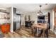 Open-concept living space with modern appliances, dining area, and comfortable seating at 5904 Hagood Ave, Hanahan, SC 29410