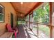 Screened porch with wood flooring, ceiling fan and an outdoor view at 5904 Hagood Ave, Hanahan, SC 29410