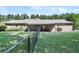 A fenced backyard enhances this brick home with an expansive lawn and covered patio, perfect for relaxation and outdoor enjoyment at 598 Maple Branch Rd, Reevesville, SC 29471