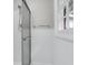 Updated bathroom has a white shower and new windows at 598 Maple Branch Rd, Reevesville, SC 29471