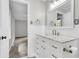 Beautiful bathroom with marble countertop, updated vanity, and tiled floor at 598 Maple Branch Rd, Reevesville, SC 29471