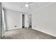 Neutral bedroom offers a closet and a doorway to the adjoining space at 598 Maple Branch Rd, Reevesville, SC 29471
