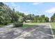 Exterior view of the property features large front yard and driveway at 598 Maple Branch Rd, Reevesville, SC 29471