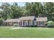 Single story brick home with black shutters, well-maintained lawn and landscaping at 598 Maple Branch Rd, Reevesville, SC 29471