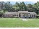 Single story brick home with black shutters, well-maintained lawn and landscaping at 598 Maple Branch Rd, Reevesville, SC 29471