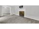 Inviting living room features a fireplace and an open layout to an adjacent space at 598 Maple Branch Rd, Reevesville, SC 29471
