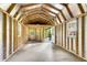 Shed's bright, unfinished interior with a rear doorway, offering a versatile space for storage or workshop at 598 Maple Branch Rd, Reevesville, SC 29471