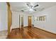 Bedroom with hardwood floors and neutral paint, attached bathroom is visible through door at 604 Longstreet St, Summerville, SC 29486