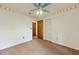 Bedroom with neutral paint, carpet flooring, and ceiling fan at 604 Longstreet St, Summerville, SC 29486