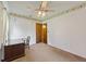 Cozy bedroom with carpeted floors, ceiling fan, and a sunny window at 604 Longstreet St, Summerville, SC 29486