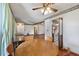 Cozy dining area with wood table, chairs, and view to kitchen at 604 Longstreet St, Summerville, SC 29486