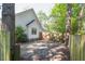 Backyard with trees and a wooden fence. The ground is mostly dirt at 642 Bridlewood Ln, Mount Pleasant, SC 29464