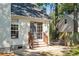 Exterior view of home's backyard with patio, stairs, and fenced-in yard at 642 Bridlewood Ln, Mount Pleasant, SC 29464