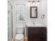 Bathroom with shower, toilet, and vanity with a dark wood cabinet at 642 Bridlewood Ln, Mount Pleasant, SC 29464