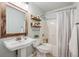 Bathroom featuring a pedestal sink and shower/tub combo at 642 Bridlewood Ln, Mount Pleasant, SC 29464