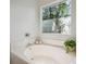 Relax in this soaking tub near the window with views at 642 Bridlewood Ln, Mount Pleasant, SC 29464