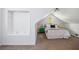 Cozy bedroom with neutral walls and carpet flooring, featuring a comfortable bed and built-in shelving at 642 Bridlewood Ln, Mount Pleasant, SC 29464