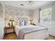 The bedroom is bright with natural light and features a decorative wall at 642 Bridlewood Ln, Mount Pleasant, SC 29464