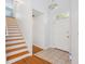 Bright entryway with wood and tile flooring, stairs, and natural light at 642 Bridlewood Ln, Mount Pleasant, SC 29464