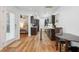Open kitchen with dark cabinets, butcher block countertops, and stainless steel appliances, connected to the bedroom at 642 Bridlewood Ln, Mount Pleasant, SC 29464