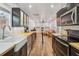 The kitchen features wood floors, butcher block counters, and white tile backsplash at 642 Bridlewood Ln, Mount Pleasant, SC 29464