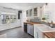 Bright kitchen featuring a large window, butcher block countertops, stainless steel appliances, and farmhouse sink at 642 Bridlewood Ln, Mount Pleasant, SC 29464